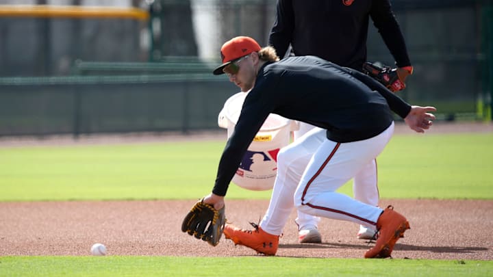 Orioles infielder Gunnar Henderson fields a ground ball during drills on Tuesday. The Baltimore Orioles held their first full-squad workout of the 2025 spring training season on Tuesday, Feb. 18th in Sarasota, Florida.