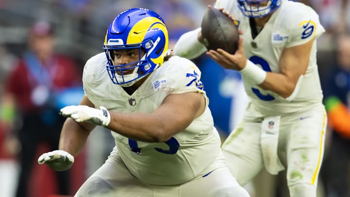 Nov 26, 2023; Glendale, Arizona, USA; Los Angeles Rams guard Steve Avila (73) against the Arizona Cardinals at State Farm Stadium. Mandatory Credit: Mark J. Rebilas-Imagn Images
