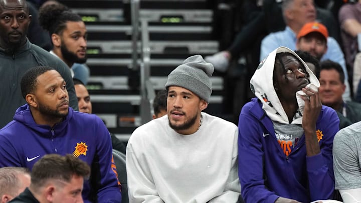 Mar 7, 2024; Phoenix, Arizona, USA; Phoenix Suns guard Devin Booker (1) looks on against the Toronto