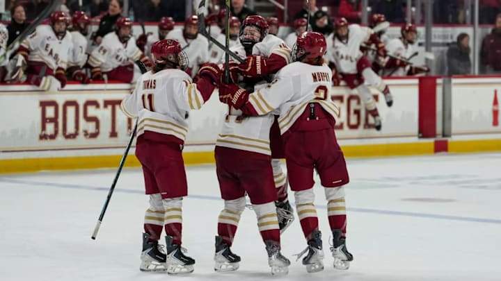 Boston College celebrate after Sammy Taber scores an overtime goal against Maine. Boston College celebrate after Sammy Taber scores an overtime goal against Maine.