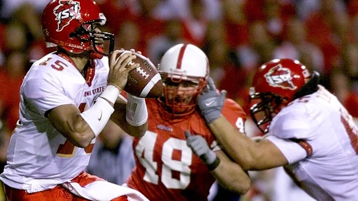 Nebraska linebacker Jamie Burrow pressures Iowa State quarterback Seneca Wallace during the Huskers' 48-14 win over the Cyclones in 2001.