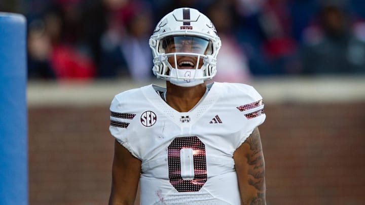 Mississippi State's quarterback Michael Van Buren Jr. (0) celebrates scoring a touchdown during the Egg Bowl game against Mississippi at Vaught-Hemingway Stadium on Friday, Nov. 29, 2024.