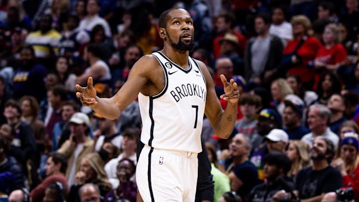 Jan 6, 2023; New Orleans, Louisiana, USA; Brooklyn Nets forward Kevin Durant (7) reacts to guard Kyrie Irving (11) making a three point basket against the New Orleans Pelicans during the second half at Smoothie King Center. Mandatory Credit: Stephen Lew-Imagn Images Jan 6, 2023; New Orleans, Louisiana, USA; Brooklyn Nets forward Kevin Durant (7) reacts to guard Kyrie Irving (11) making a three point basket against the New Orleans Pelicans during the second half at Smoothie King Center. Mandatory Credit: Stephen Lew-Imagn Images