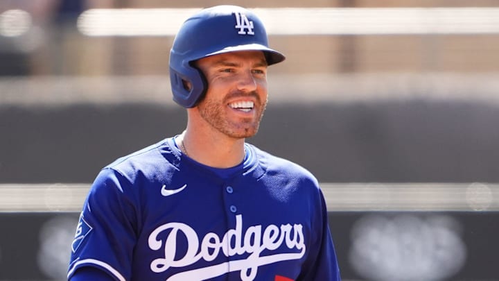 Los Angeles Dodgers Freddie Freeman smiles after hitting a 2-RBI double off Arizona Diamondbacks pitcher John Curtiss in the first inning during a spring training game at Camelback Ranch-Glendale in Phoenix on March 10, 2025.