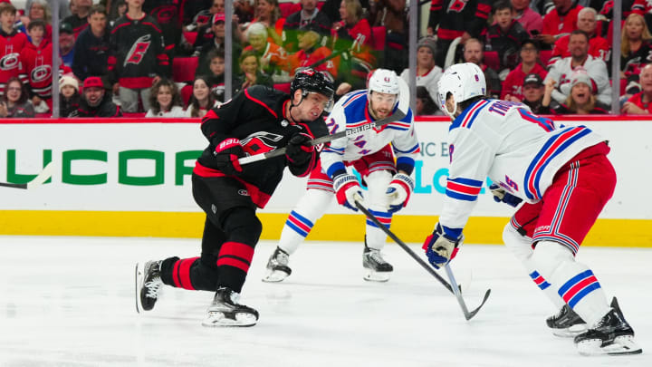 May 11, 2024; Raleigh, North Carolina, USA; Carolina Hurricanes center Evgeny Kuznetsov (92) scores a goal against the New York Rangers during the first period in game four of the second round of the 2024 Stanley Cup Playoffs at PNC Arena. Mandatory Credit: James Guillory-USA TODAY Sports