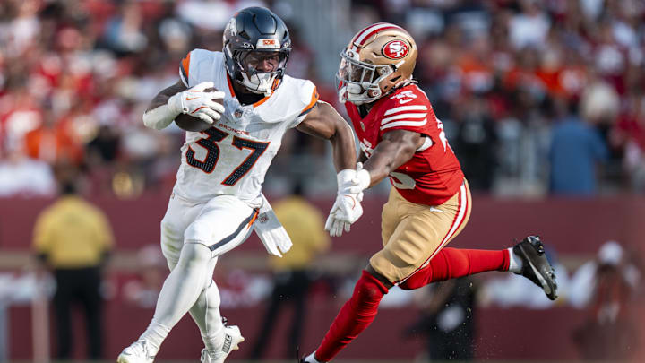 August 9, 2025; Santa Clara, California, USA; Denver Broncos running back RJ Harvey (37) runs the football against San Francisco 49ers linebacker Nick Martin (45) during the first quarter at Levi's Stadium. August 9, 2025; Santa Clara, California, USA; Denver Broncos running back RJ Harvey (37) runs the football against San Francisco 49ers linebacker Nick Martin (45) during the first quarter at Levi's Stadium.