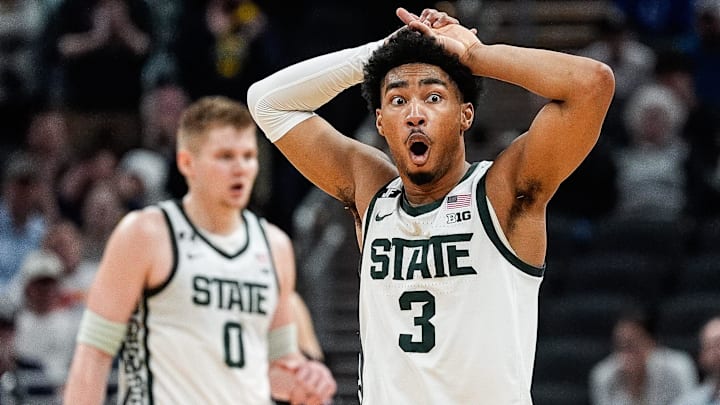 Michigan State guard Jaden Akins reacts to a personal foul against Wisconsin during the second half of Big Ten tournament semifinal at Gainbridge Fieldhouse.