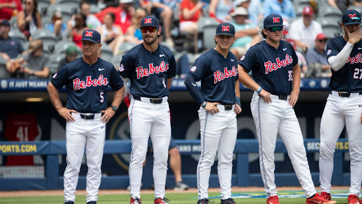 Ole Miss Rebels head coach Mike Bianco (5) watches on during introductions as Ole Miss Rebels take on Vanderbilt Commodores during the SEC baseball tournament championship game at Hoover Met in Birmingham, Ala., on Sunday, May 25, 2025. Ole Miss Rebels head coach Mike Bianco (5) watches on during introductions as Ole Miss Rebels take on Vanderbilt Commodores during the SEC baseball tournament championship game at Hoover Met in Birmingham, Ala., on Sunday, May 25, 2025.