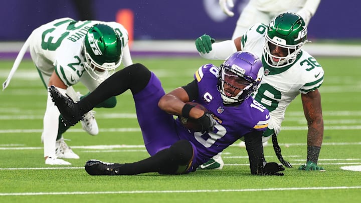 Oct 6, 2024; Tottenham, ENG; New York Jets defensive back Chuck Clark (36) tackles Minnesota Vikings Wide Receiver Justin Jefferson (18) in the 4th Quarter at Tottenham Hotspur Stadium. Oct 6, 2024; Tottenham, ENG; New York Jets defensive back Chuck Clark (36) tackles Minnesota Vikings Wide Receiver Justin Jefferson (18) in the 4th Quarter at Tottenham Hotspur Stadium.