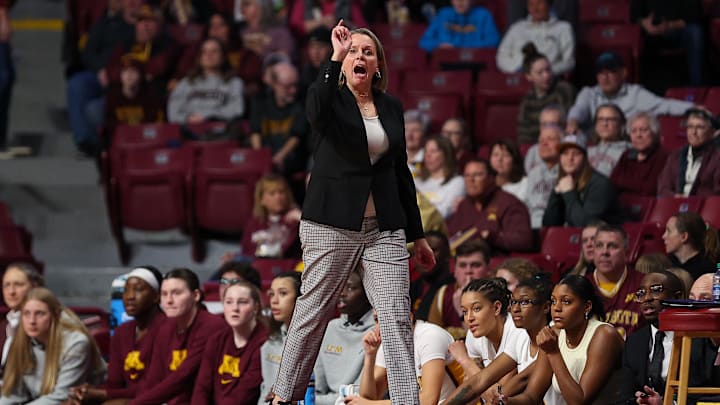 Jan 31, 2024; Minneapolis, Minnesota, USA; Minnesota Golden Gophers head coach Dawn Plitzuweit reacts during the first half against the Penn State Nittany Lions at Williams Arena. Mandatory Credit: Matt Krohn-Imagn Images Jan 31, 2024; Minneapolis, Minnesota, USA; Minnesota Golden Gophers head coach Dawn Plitzuweit reacts during the first half against the Penn State Nittany Lions at Williams Arena. Mandatory Credit: Matt Krohn-Imagn Images