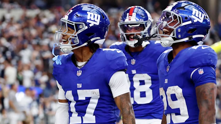 Sep 14, 2025; Arlington, Texas, USA; New York Giants wide receiver Wan'Dale Robinson (17) celebrates after scoring a touchdown against the Dallas Cowboys during the fourth quarter at AT&T Stadium. Sep 14, 2025; Arlington, Texas, USA; New York Giants wide receiver Wan'Dale Robinson (17) celebrates after scoring a touchdown against the Dallas Cowboys during the fourth quarter at AT&T Stadium.