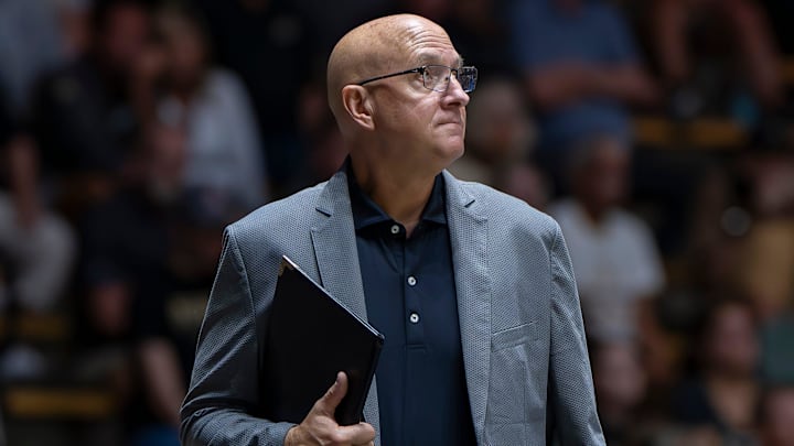 Purdue head coach Dave Shondell watches on