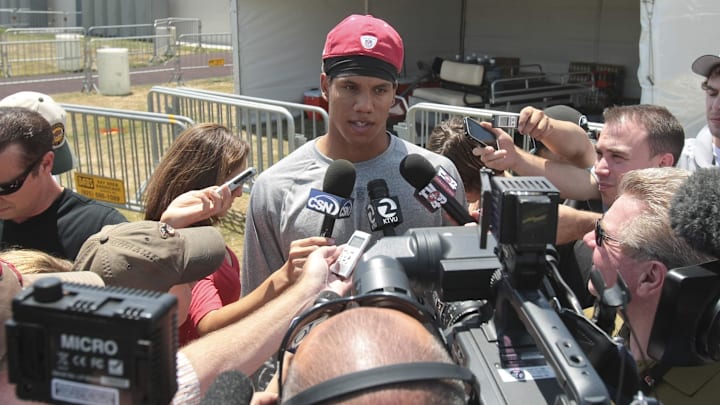 Taylor Mays is surrounded by reporters as a San Francisco 49ers safety. Taylor Mays is surrounded by reporters as a San Francisco 49ers safety.