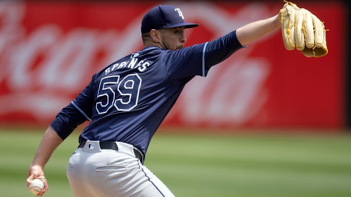 Aug 22, 2024; Oakland, California, USA; Tampa Bay Rays starting pitcher Jeffrey Springs (59) delivers a pitch against the Oakland Athletics during the first inning at Oakland-Alameda County Coliseum. Mandatory Credit: D. Ross Cameron-Imagn Images