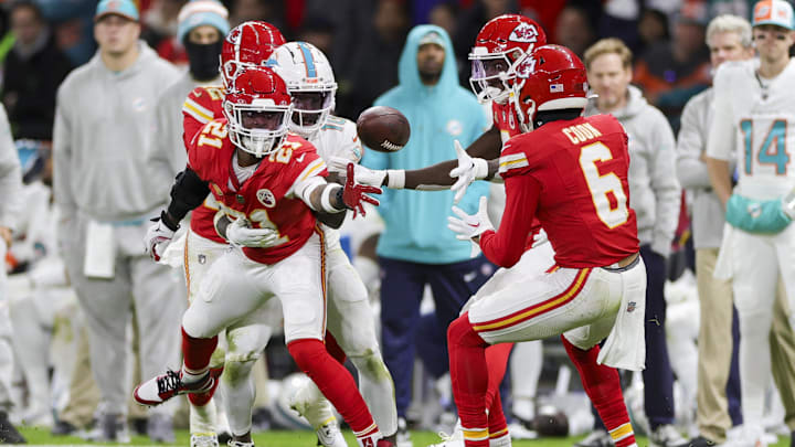 Nov 5, 2023; Frankfurt, Germany, ;  Kansas City Chiefs safety Mike Edwards (21) tosses the ball back