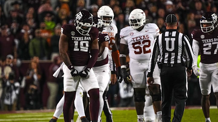 Texas A&M defensive lineman Cashius Howell (18) celebrates a defensive stop during the Lone Star Showdown against the Texas Longhorns at Kyle Field.