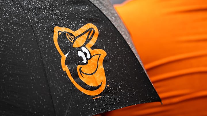 Aug 22, 2021; Baltimore, Maryland, USA; A Baltimore Orioles logo is seen on an umbrella during the game between the Baltimore Orioles and the Atlanta Braves at Oriole Park at Camden Yards.