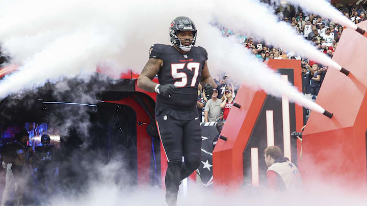 Dec 15, 2024; Houston Texans offensive tackle Blake Fisher (57) runs onto the field before the game against the Miami Dolphins at NRG Stadium. Mandatory Credit: Troy Taormina-Imagn Images