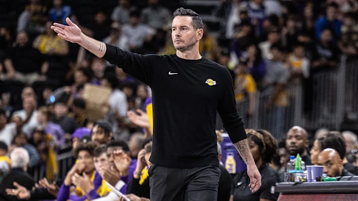 Los Angeles Lakers coach JJ Redick reacts during a preseason game.