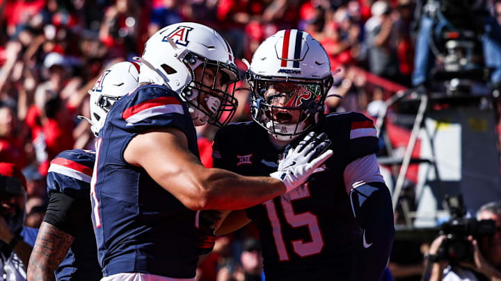 Nov 8, 2025; Tucson, Arizona, USA; Arizona Wildcats tight end Sam Olson (84) celebrates a touchdown pass during the first quarter of the game against the Kansas Jayhawks at Arizona Stadium. Mandatory Credit: Aryanna Frank-Imagn Images