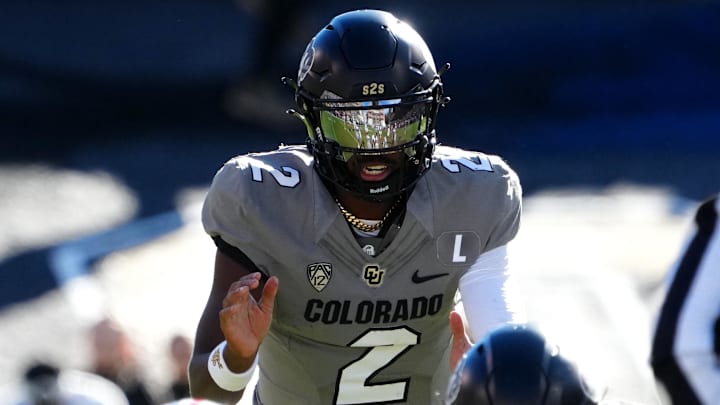 Nov 11, 2023; Boulder, Colorado, USA; Colorado Buffaloes quarterback Shedeur Sanders (2) at the line