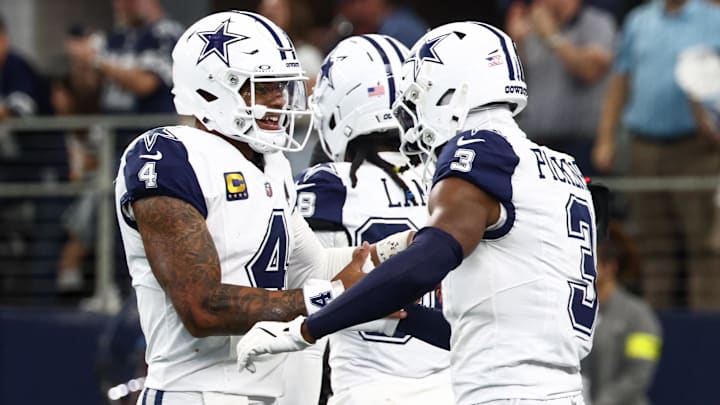 Dallas Cowboys quarterback Dak Prescott and receiver George Pickens celebrate a touchdown against the Washington Commanders Dallas Cowboys quarterback Dak Prescott and receiver George Pickens celebrate a touchdown against the Washington Commanders