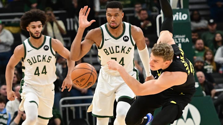 Nov 7, 2024; Milwaukee, Wisconsin, USA; Utah Jazz forward Lauri Markkanen (23) reaches for the ball against Milwaukee Bucks forward Giannis Antetokounmpo (34) and guard Andre Jackson Jr. (44) in the first quarter at Fiserv Forum. Mandatory Credit: Benny Sieu-Imagn Images Nov 7, 2024; Milwaukee, Wisconsin, USA; Utah Jazz forward Lauri Markkanen (23) reaches for the ball against Milwaukee Bucks forward Giannis Antetokounmpo (34) and guard Andre Jackson Jr. (44) in the first quarter at Fiserv Forum. Mandatory Credit: Benny Sieu-Imagn Images