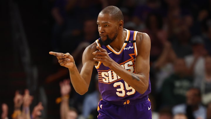 Mar 24, 2025; Phoenix, Arizona, USA; Phoenix Suns forward Kevin Durant (35) reacts against the Milwaukee Bucks at Footprint Center. Mandatory Credit: Mark J. Rebilas-Imagn Images