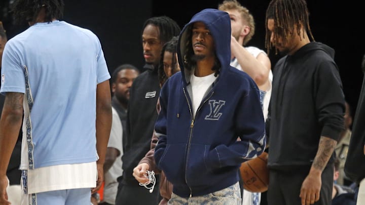 Jan 11, 2026; Memphis, Tennessee, USA; Memphis Grizzlies guard Ja Morant (12) looks on during a timeout during the first quarter against the Brooklyn Nets at FedExForum. Mandatory Credit: Petre Thomas-Imagn Images
