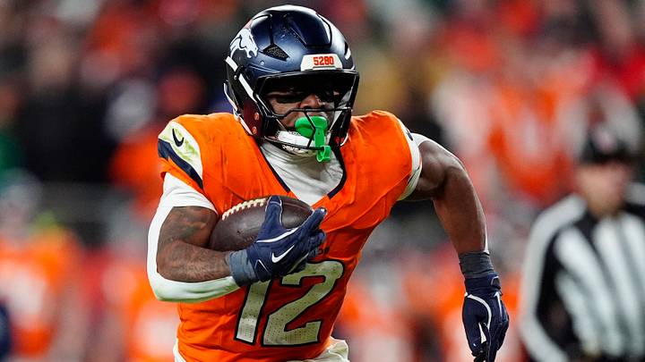 Dec 14, 2025; Denver, Colorado, USA; Denver Broncos running back RJ Harvey (12) runs for a gain during the fourth quarter against the Green Bay Packers at Empower Field at Mile High. Dec 14, 2025; Denver, Colorado, USA; Denver Broncos running back RJ Harvey (12) runs for a gain during the fourth quarter against the Green Bay Packers at Empower Field at Mile High.