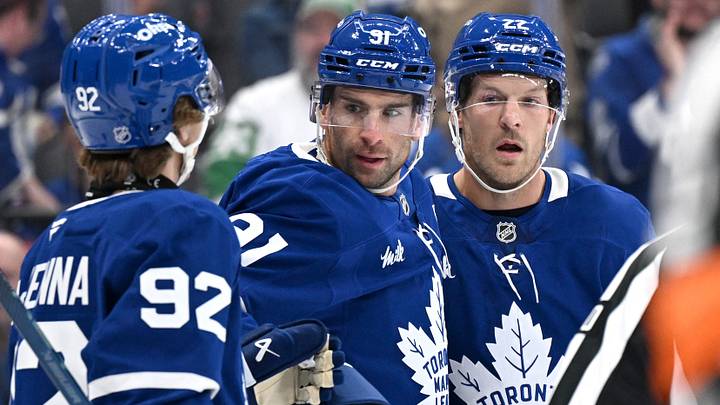 Sep 23, 2026; Toronto, Ontario, CAN; Toronto Maple Leafs defenseman Jake McCabe (22) celebrates with forwards John Tavares (91) and Gavin McKenna (92) after scoring a goal against the Ottawa Senators in the first period at Scotiabank Arena. Mandatory Credit: Dan Hamilton-Imagn Images Sep 23, 2026; Toronto, Ontario, CAN; Toronto Maple Leafs defenseman Jake McCabe (22) celebrates with forwards John Tavares (91) and Gavin McKenna (92) after scoring a goal against the Ottawa Senators in the first period at Scotiabank Arena. Mandatory Credit: Dan Hamilton-Imagn Images