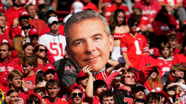 Ohio State Buckeyes fans hold up a giant Urban Meyer sign during the second half of the NCAA football game against the Nebraska Cornhuskers at Ohio Stadium in Columbus on Saturday, Oct. 26, 2024. Ohio State won 21-17.