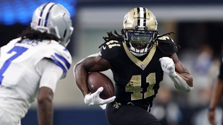 Sep 15, 2024; Arlington, Texas, USA; New Orleans Saints running back Alvin Kamara (41) runs against the Dallas Cowboys in the second half at AT&T Stadium. Mandatory Credit: Tim Heitman-Imagn Images