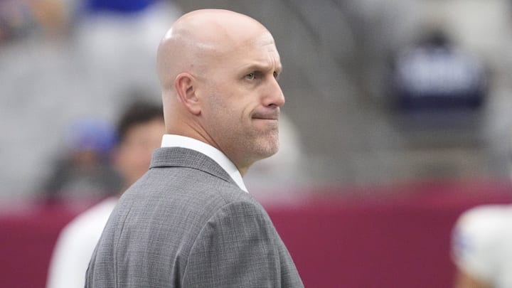 Arizona Cardinals general manager Monti Ossenfort watches his team warm up before playing against the Los Angeles Rams at State Farm Stadium on Sept. 15, 2024.