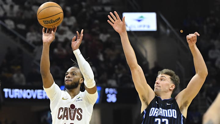 Apr 20, 2024; Cleveland, Ohio, USA; Cleveland Cavaliers guard Darius Garland (10) shoots beside Franz Wagner