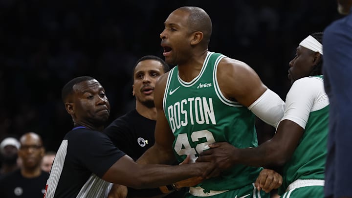 Apr 23, 2025; Boston, Massachusetts, USA; Boston Celtics center Al Horford (42) is held back by referee James Williams (60), head coach Joe Mazzulla and guard Jrue Holiday (4) after he was knocked down following a collision with Orlando Magic guard Kentavious Caldwell-Pope (3) during the second quarter of game two of the first round of the 2024 NBA Playoffs at TD Garden. Mandatory Credit: Winslow Townson-Imagn Images Apr 23, 2025; Boston, Massachusetts, USA; Boston Celtics center Al Horford (42) is held back by referee James Williams (60), head coach Joe Mazzulla and guard Jrue Holiday (4) after he was knocked down following a collision with Orlando Magic guard Kentavious Caldwell-Pope (3) during the second quarter of game two of the first round of the 2024 NBA Playoffs at TD Garden. Mandatory Credit: Winslow Townson-Imagn Images