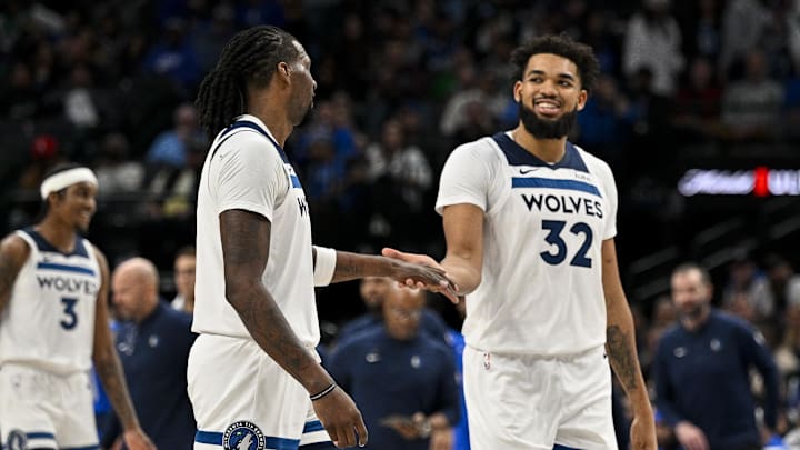 Dec 14, 2023; Dallas, Texas, USA; Minnesota Timberwolves center Naz Reid (11) and center Karl-Anthony Towns (32) walk off the court during the second half against the Dallas Mavericks at the American Airlines Center. Mandatory Credit: Jerome Miron-Imagn Images