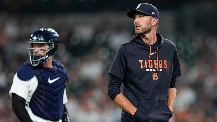 Detroit Tigers pitching coach Chris Fetter (41) walks off the field after a mound visit. Detroit Tigers pitching coach Chris Fetter (41) walks off the field after a mound visit.