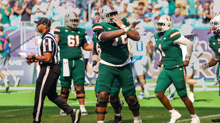 Nov 2, 2024; Miami Gardens, Florida, USA; Miami Hurricanes offensive lineman Matthew McCoy (78) celebrates after scoring on a two-point conversion against the Duke Blue Devils during the third quarter at Hard Rock Stadium. Mandatory Credit: Sam Navarro-Imagn Images Nov 2, 2024; Miami Gardens, Florida, USA; Miami Hurricanes offensive lineman Matthew McCoy (78) celebrates after scoring on a two-point conversion against the Duke Blue Devils during the third quarter at Hard Rock Stadium. Mandatory Credit: Sam Navarro-Imagn Images