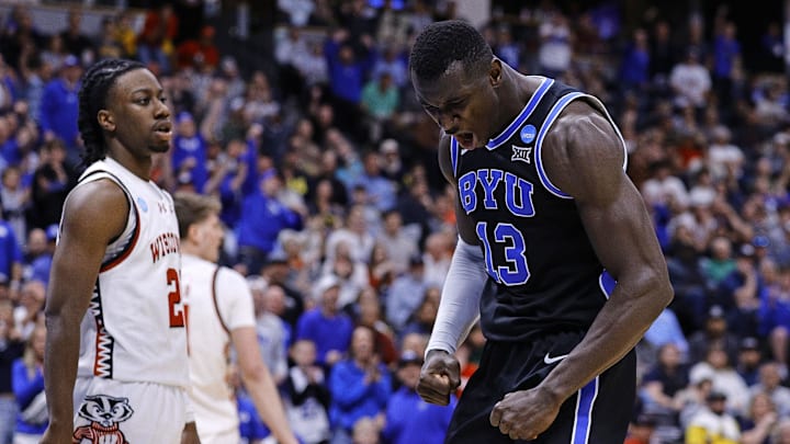 Mar 22, 2025; Denver, CO, USA; Brigham Young Cougars center Keba Keita (13) reacts against the Wisconsin Badgers during the second half in the second round of the NCAA Tournament at Ball Arena. Mandatory Credit: Isaiah J. Downing-Imagn Images Mar 22, 2025; Denver, CO, USA; Brigham Young Cougars center Keba Keita (13) reacts against the Wisconsin Badgers during the second half in the second round of the NCAA Tournament at Ball Arena. Mandatory Credit: Isaiah J. Downing-Imagn Images