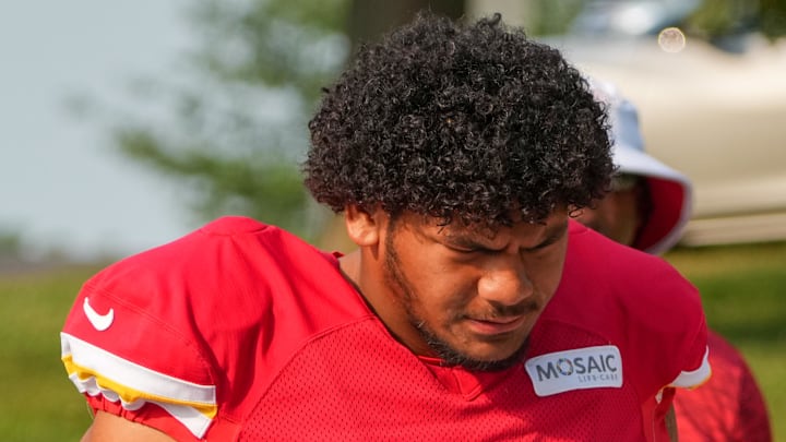 Jul 26, 2024; Kansas City, MO, USA; Kansas City Chiefs offensive tackle Kingsley Suamataia (76) walks from the locker room to the fields prior to training camp at Missouri Western State University. Mandatory Credit: Denny Medley-Imagn Images