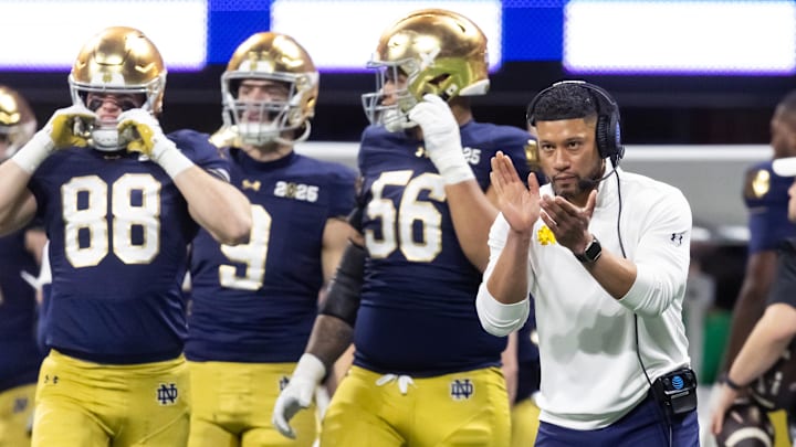 Jan 20, 2025; Atlanta, GA, USA; Notre Dame Fighting Irish head coach Marcus Freeman against the Ohio State Buckeyes during the CFP National Championship college football game at Mercedes-Benz Stadium. Jan 20, 2025; Atlanta, GA, USA; Notre Dame Fighting Irish head coach Marcus Freeman against the Ohio State Buckeyes during the CFP National Championship college football game at Mercedes-Benz Stadium.