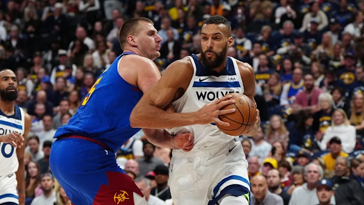 Minnesota Timberwolves center Rudy Gobert (27) and Denver Nuggets center Nikola Jokic (15) in the first quarter during game one of the second round for the 2024 NBA playoffs at Ball Arena in Denver on May 4, 2024. 