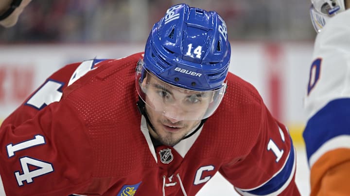 Jan 25, 2024; Montreal, Quebec, CAN; Montreal Canadiens forward Nick Suzuki (14) prepares for a face