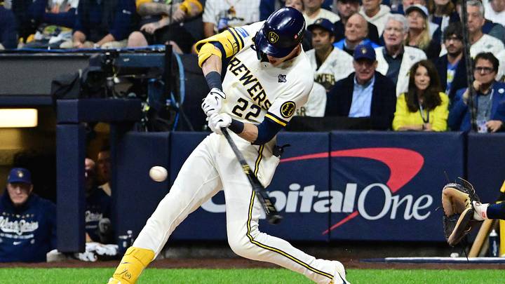 Oct 23, 2026; Milwaukee, Wisconsin, USA; Milwaukee Brewers designated hitter Christian Yelich (22) hits an RBI triple during the first inning against the Tampa Bay Rays in game one of the 2026 World Series at American Family Field. Mandatory Credit: Benny Sieu-Imagn Images Oct 23, 2026; Milwaukee, Wisconsin, USA; Milwaukee Brewers designated hitter Christian Yelich (22) hits an RBI triple during the first inning against the Tampa Bay Rays in game one of the 2026 World Series at American Family Field. Mandatory Credit: Benny Sieu-Imagn Images