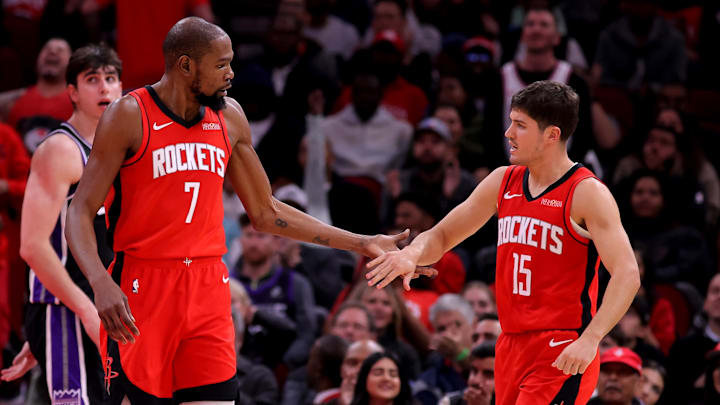 Dec 3, 2025; Houston, Texas, USA; Houston Rockets forward Kevin Durant (7) is greeted by Houston Rockets guard Reed Sheppard (15) after a basket during the third quarter at Toyota Center. Mandatory Credit: Erik Williams-Imagn Images
