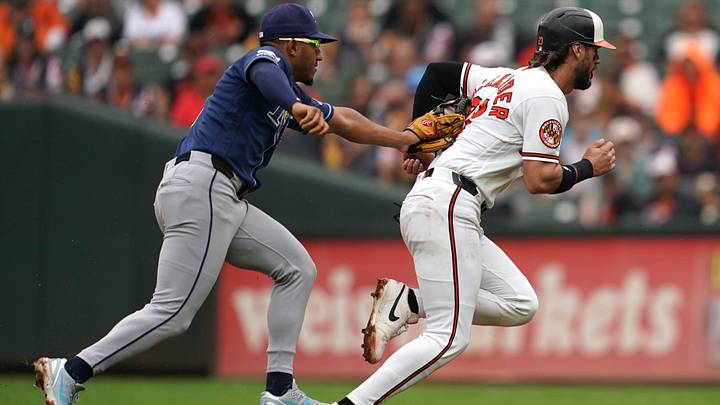 May 25, 2026; Baltimore, Maryland, USA; Baltimore Orioles shortstop Blaze Alexander (23) is tagged out by Tampa Bay Rays second baseman Richie Palacios (1) on a steal attempt after a pickoff throw during the third inning at Oriole Park at Camden Yards. May 25, 2026; Baltimore, Maryland, USA; Baltimore Orioles shortstop Blaze Alexander (23) is tagged out by Tampa Bay Rays second baseman Richie Palacios (1) on a steal attempt after a pickoff throw during the third inning at Oriole Park at Camden Yards.