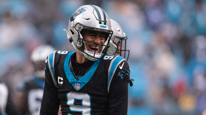 Nov 30, 2025; Charlotte, North Carolina, USA; Carolina Panthers quarterback Bryce Young (9) celebrates after a touchdown during the third quarter against the Los Angeles Rams at Bank of America Stadium. Mandatory Credit: Scott Kinser-Imagn Images