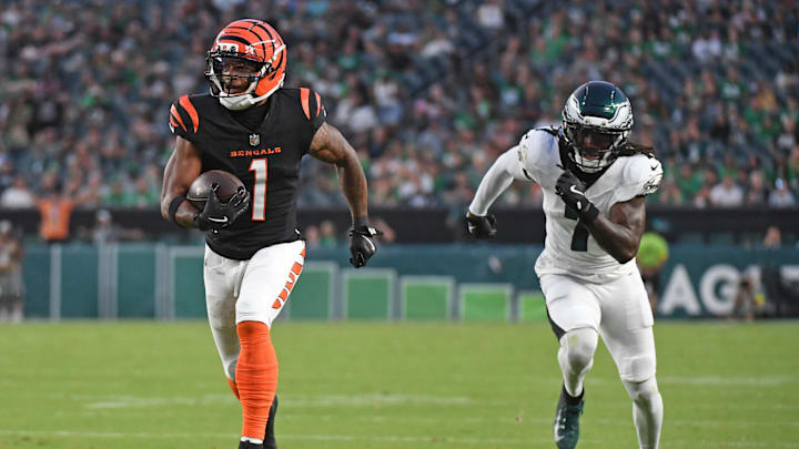 Aug 7, 2025; Philadelphia, Pennsylvania, USA; Cincinnati Bengals wide receiver Ja'Marr Chase (1) runs past Philadelphia Eagles cornerback Kelee Ringo (7) on a 36-yard touchdown catch during the first quarter against the Philadelphia Eagles at Lincoln Financial Field. Mandatory Credit: Eric Hartline-Imagn Images Aug 7, 2025; Philadelphia, Pennsylvania, USA; Cincinnati Bengals wide receiver Ja'Marr Chase (1) runs past Philadelphia Eagles cornerback Kelee Ringo (7) on a 36-yard touchdown catch during the first quarter against the Philadelphia Eagles at Lincoln Financial Field. Mandatory Credit: Eric Hartline-Imagn Images