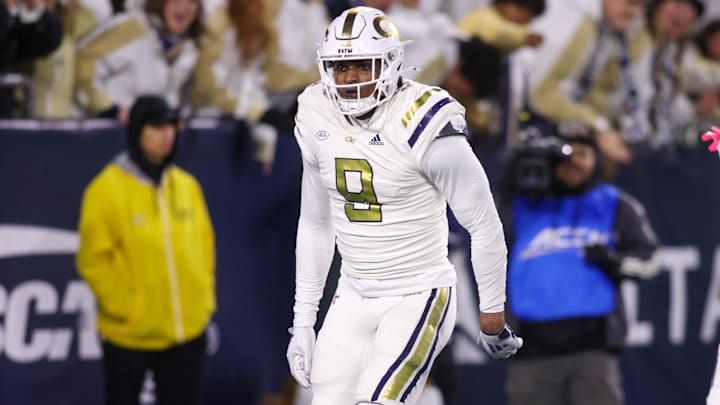 Nov 21, 2024; Atlanta, Georgia, USA; Georgia Tech Yellow Jackets defensive lineman Romello Height (9) celebrates after an interception against the North Carolina State Wolfpack in the fourth quarter at Bobby Dodd Stadium at Hyundai Field. Mandatory Credit: Brett Davis-Imagn Images
